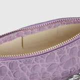 Mini Rachel Lilac Croco Embossed Leather Bag held in hand against white background — By Far | Endless UAE