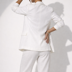 Woman wearing white linen blazer and trousers with white sandals — & Other Stories | Endless UAE