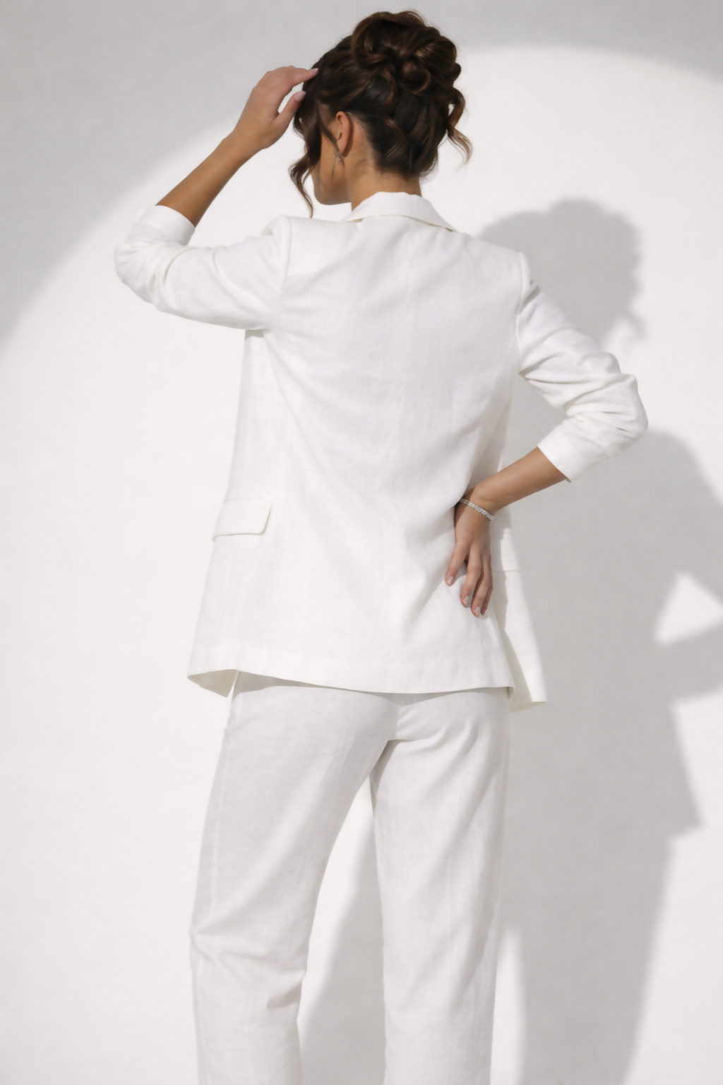 Woman wearing white linen blazer and trousers with white sandals — & Other Stories | Endless UAE