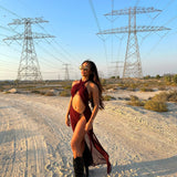 Brown La Musique Halter Neck Sheer Dress worn by woman posing in desert with power lines — Scorpio Rizing | Endless UAE