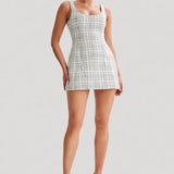 Beth Tweed Mini Dress in white grid pattern with square neckline and sleeveless design — Meshki | Endless UAE
