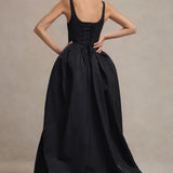 Black maxi dress with corset lace-up back and voluminous high-low skirt, rear view — Club L London | Endless UAE