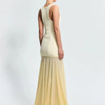 Odessa Gown in cream and pale yellow, sleeveless fitted bodice with flowing pleated skirt and train — Effie Kats | Endless UAE