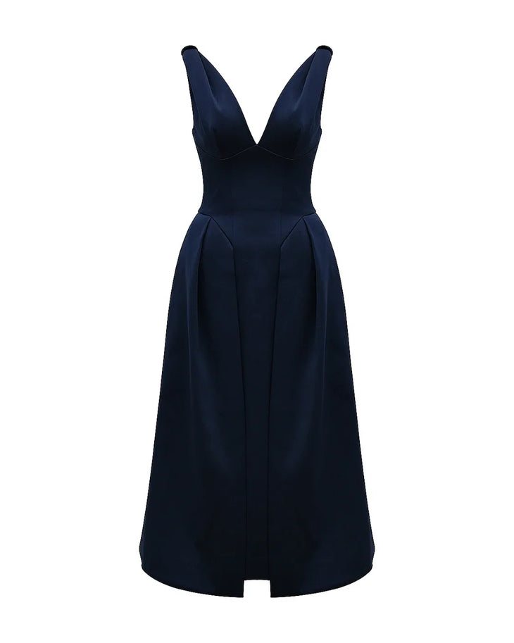 Woman wearing navy blue satin midi dress with twisted shoulder straps and full skirt — House of CB | Endless UAE