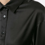 Black cropped silk shirt with wrap-around tie detail and collar, worn by model — Christopher Esber | Endless UAE