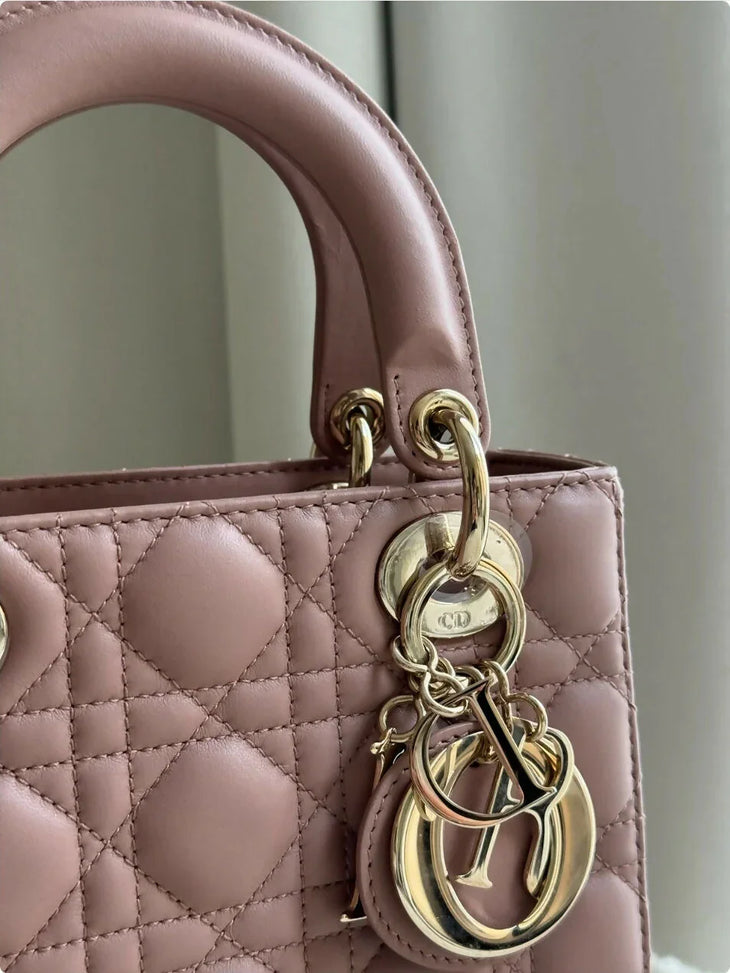 Small Lady Dior bag in pink quilted leather with gold-tone chain and CD charm detail — Christian Dior | Endless UAE