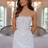 Elegant white strapless mini dress with sequin embellishments and corset bodice detail — Rosie Etienne | Endless UAE
