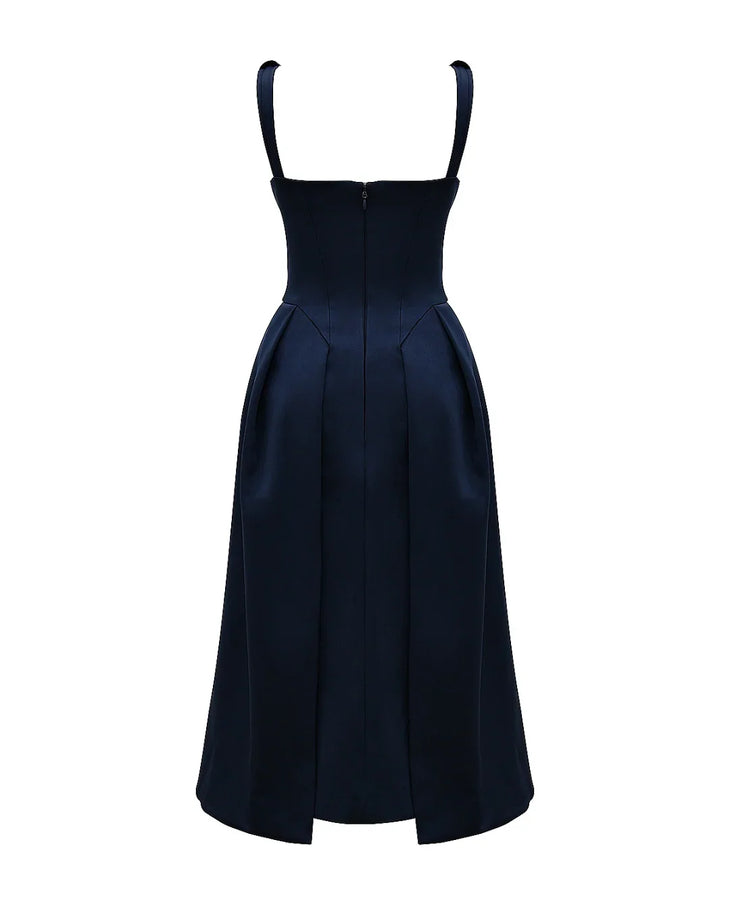 Woman wearing navy blue satin midi dress with twisted shoulder straps and full skirt — House of CB | Endless UAE