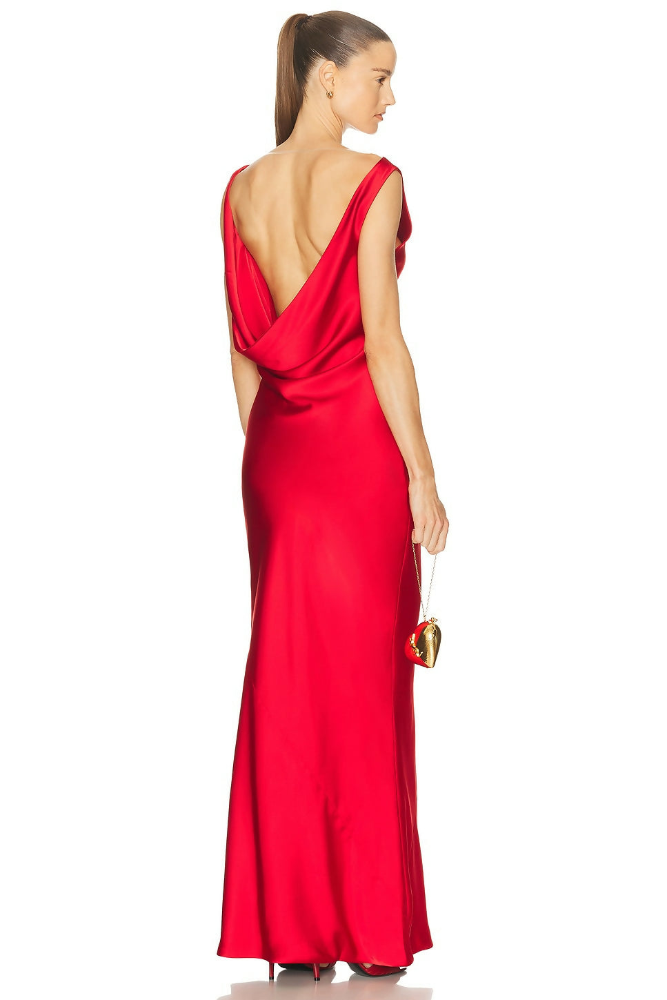 Elegant red sleeveless gown with dramatic low draped back, floor-length silhouette, model shown from behind — Norma Kamali | Endless UAE