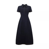Woman wearing navy cotton denim collared midi dress with short sleeves — Endless | Endless UAE