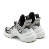 Louis Vuitton Archlight Chunky Sneaker in grey and white with black accents, rear view showing distinctive curved sole — Louis Vuitton | Endless UAE