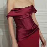 Elegant off-shoulder ruby red satin dress with draped bodice detail and fitted silhouette — Rhea Costa | Endless UAE