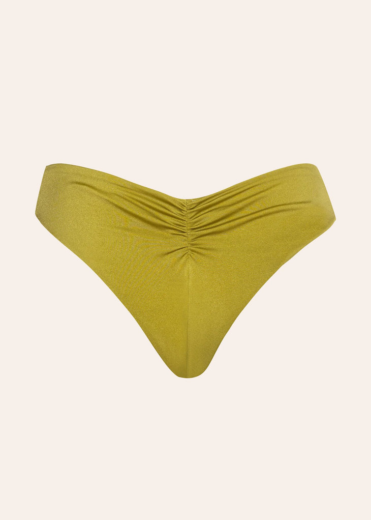 Kim Bikini Bottom in reversible green with ruched V-front detail, photographed flat lay on beige background — Dvete | Endless UAE