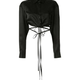 Black silk cropped shirt with wrap-around tie detail and long sleeves — Christopher Esber | Endless UAE