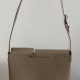 Beige patent leather shoulder bag with dual compartments and silver turnlock closures — Endless | Endless UAE