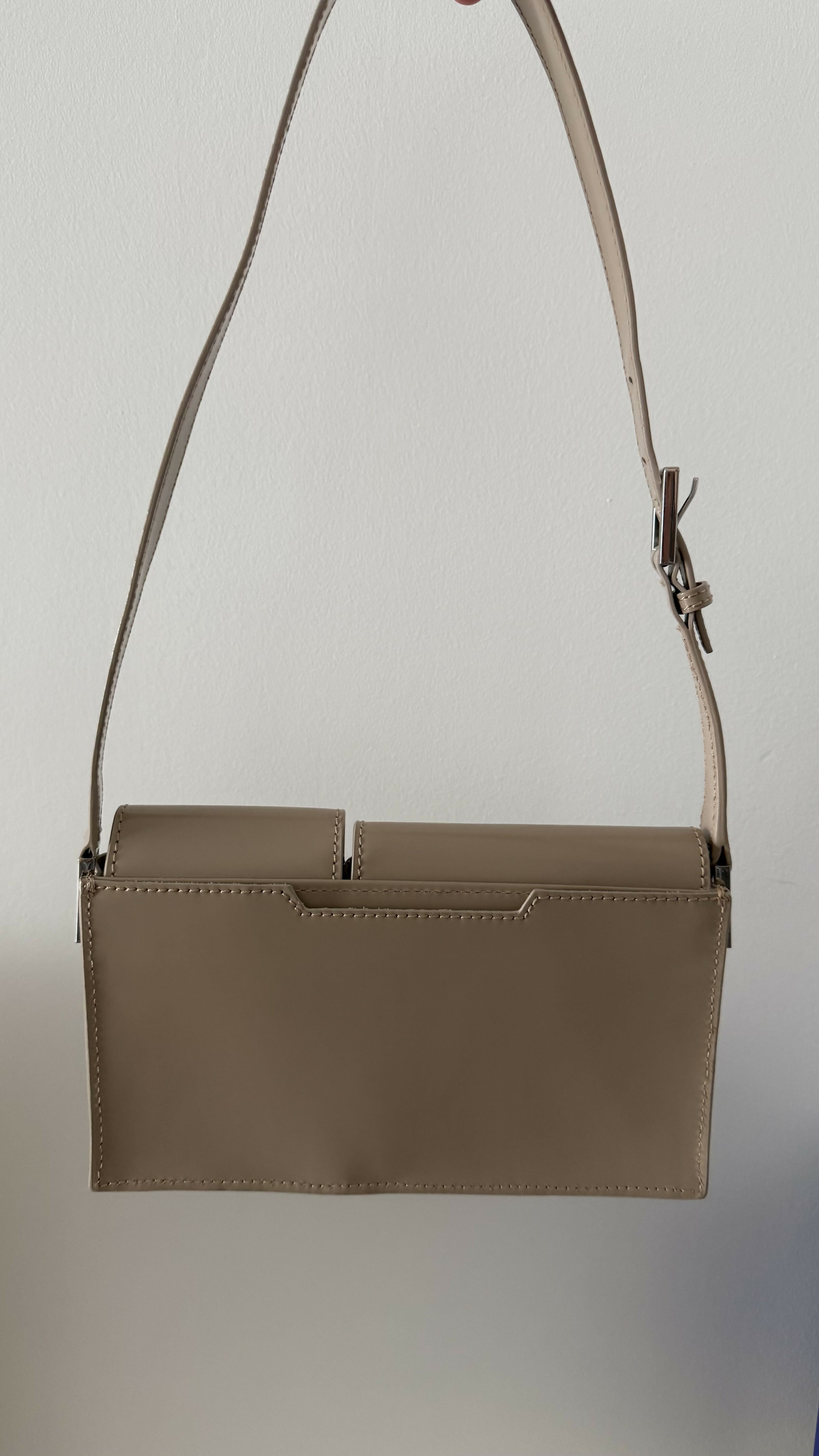 Beige patent leather shoulder bag with dual compartments and silver turnlock closures — Endless | Endless UAE