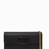 Black leather VLOGO chain wallet with gold hardware — Valentino | Endless UAE