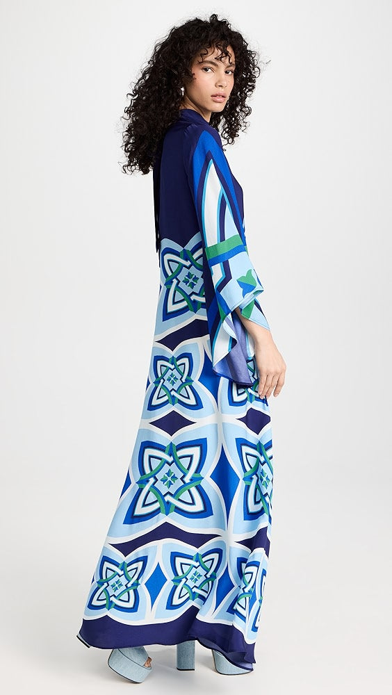Long sleeve maxi dress with geometric blue and white pattern, featuring a dramatic bell sleeve and flowing silhouette — La Doublej | Endless UAE