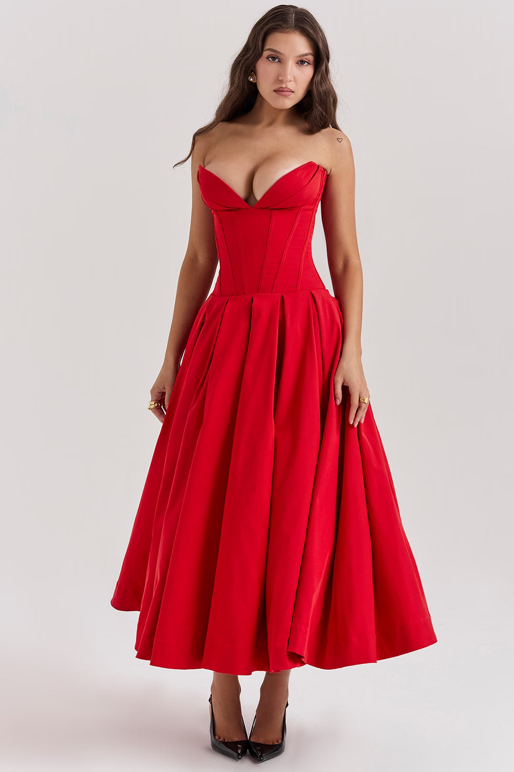 Woman wearing a red strapless corset midi dress with full skirt — House of CB | Endless UAE