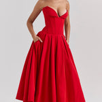 Woman wearing a red strapless corset midi dress with full skirt — House of CB | Endless UAE