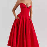 Woman wearing a red strapless corset midi dress with full skirt — House of CB | Endless UAE