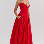 Woman wearing a red strapless corset midi dress with full skirt — House of CB | Endless UAE