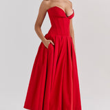 Woman wearing a red strapless corset midi dress with full skirt — House of CB | Endless UAE