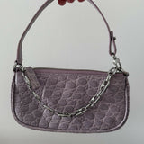 Mini Rachel Lilac Croco Embossed Leather Bag held in hand against white background — By Far | Endless UAE