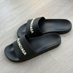 Logo Pool Slides in Black & White - Endless - UAE Rental and Resale for Women's Fashion