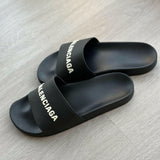 Logo Pool Slides in Black & White - Endless - UAE Rental and Resale for Women's Fashion