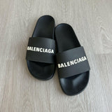 Logo Pool Slides in Black & White - Endless - UAE Rental and Resale for Women's Fashion