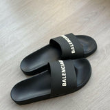 Logo Pool Slides in Black & White - Endless - UAE Rental and Resale for Women's Fashion