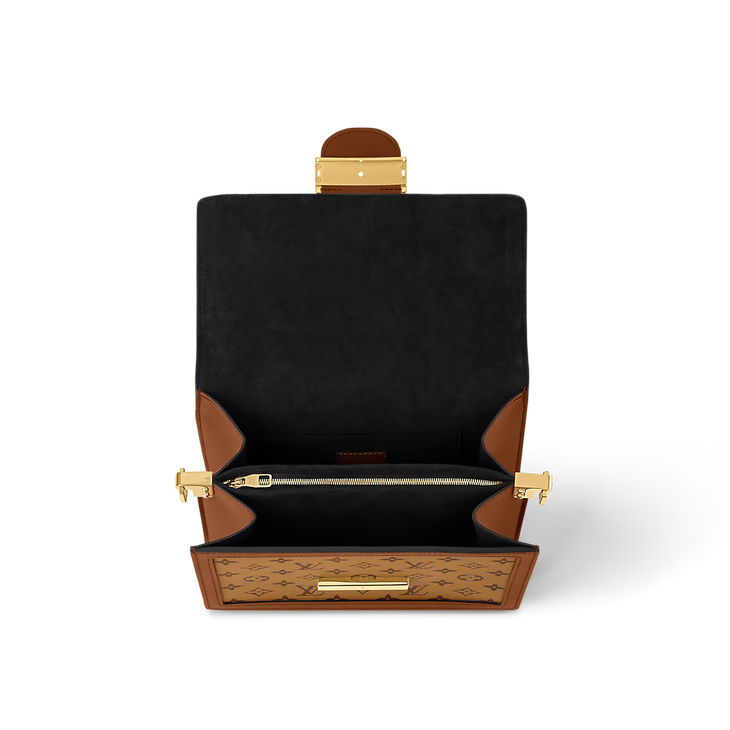 Dauphine MM bag in monogram canvas with brown leather accents, opened to display black interior and gold hardware — Louis Vuitton | Endless UAE