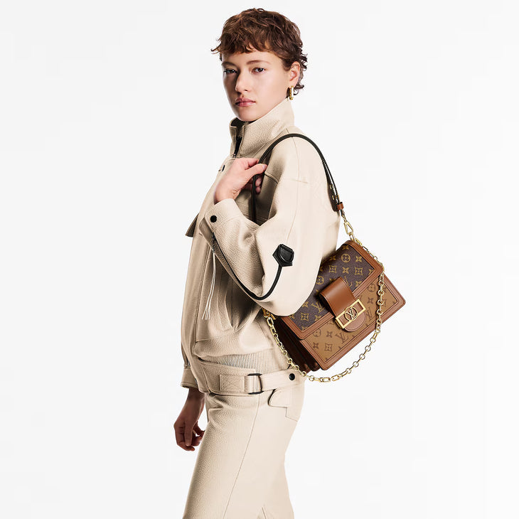 Louis Vuitton Dauphine MM Bag in Monogram canvas with brown leather trim and gold chain strap — Louis Vuitton | Endless UAE