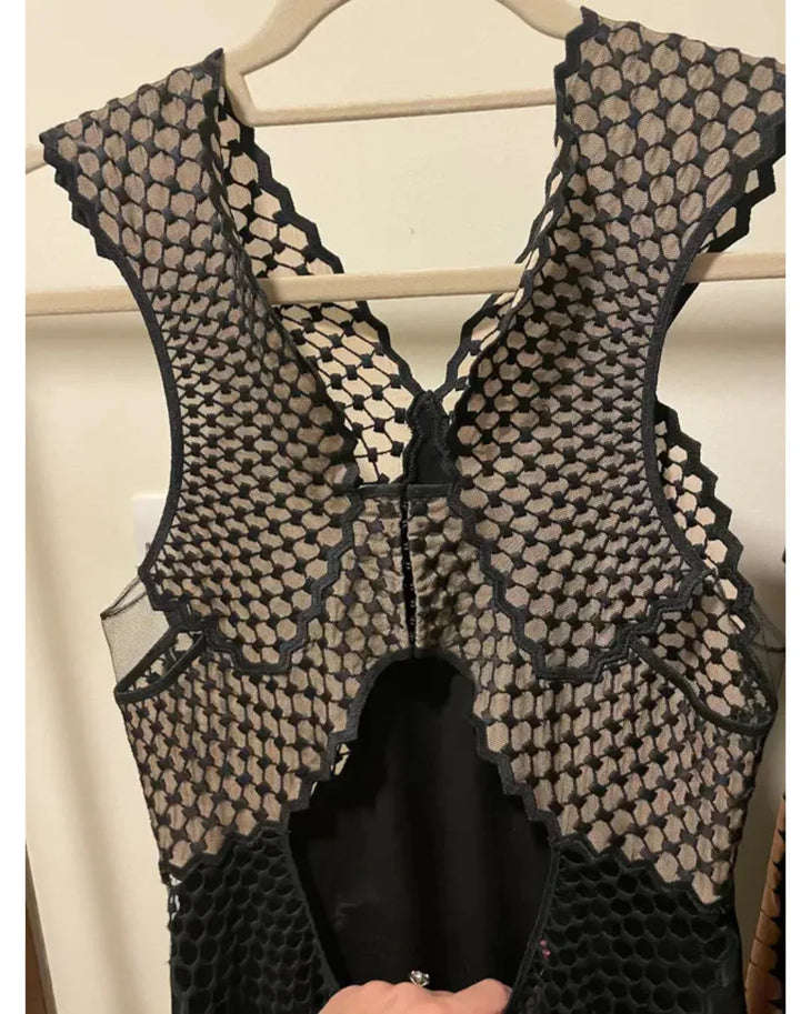 Black sleeveless catsuit with mesh panel details and wide-leg silhouette — Stella McCartney | Endless UAE