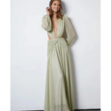 Woman wearing The Goddess Green Dress by Anne Louise Boutique — Endless UAE