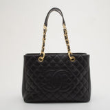 Black quilted caviar leather Grand Shopper Tote with gold chain straps and CC logo — Chanel | Endless UAE