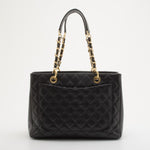 Black quilted caviar leather Grand Shopper Tote with gold chain straps and front pocket — Chanel | Endless UAE