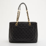 Black quilted caviar leather Grand Shopper Tote with gold chain straps and front pocket — Chanel | Endless UAE