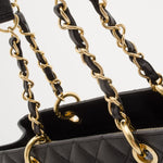 Black quilted caviar leather tote with woven gold-tone chain and leather straps — Chanel | Endless UAE