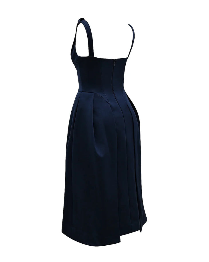 Woman wearing navy blue satin midi dress with twisted shoulder straps and full skirt — House of CB | Endless UAE