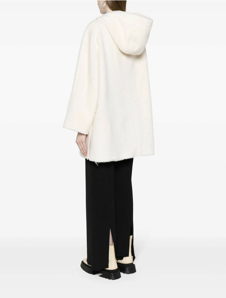Cream hooded wool-blend coat with relaxed fit, long sleeves, and mid-length hem paired with black trousers — B+ab | Endless UAE