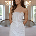 Elegant white strapless mini dress with sequin embellishments and lace trim detailing — Rosie Etienne | Endless UAE