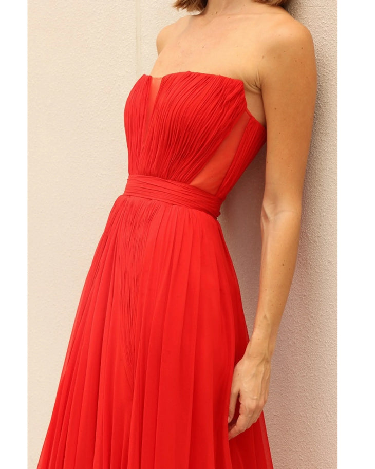 Red strapless evening gown with pleated bodice and flowing skirt — Bots© | Endless UAE