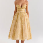 Woman wearing gold metallic lace tulle strapless midi gown with ruched waist — House of CB | Endless UAE