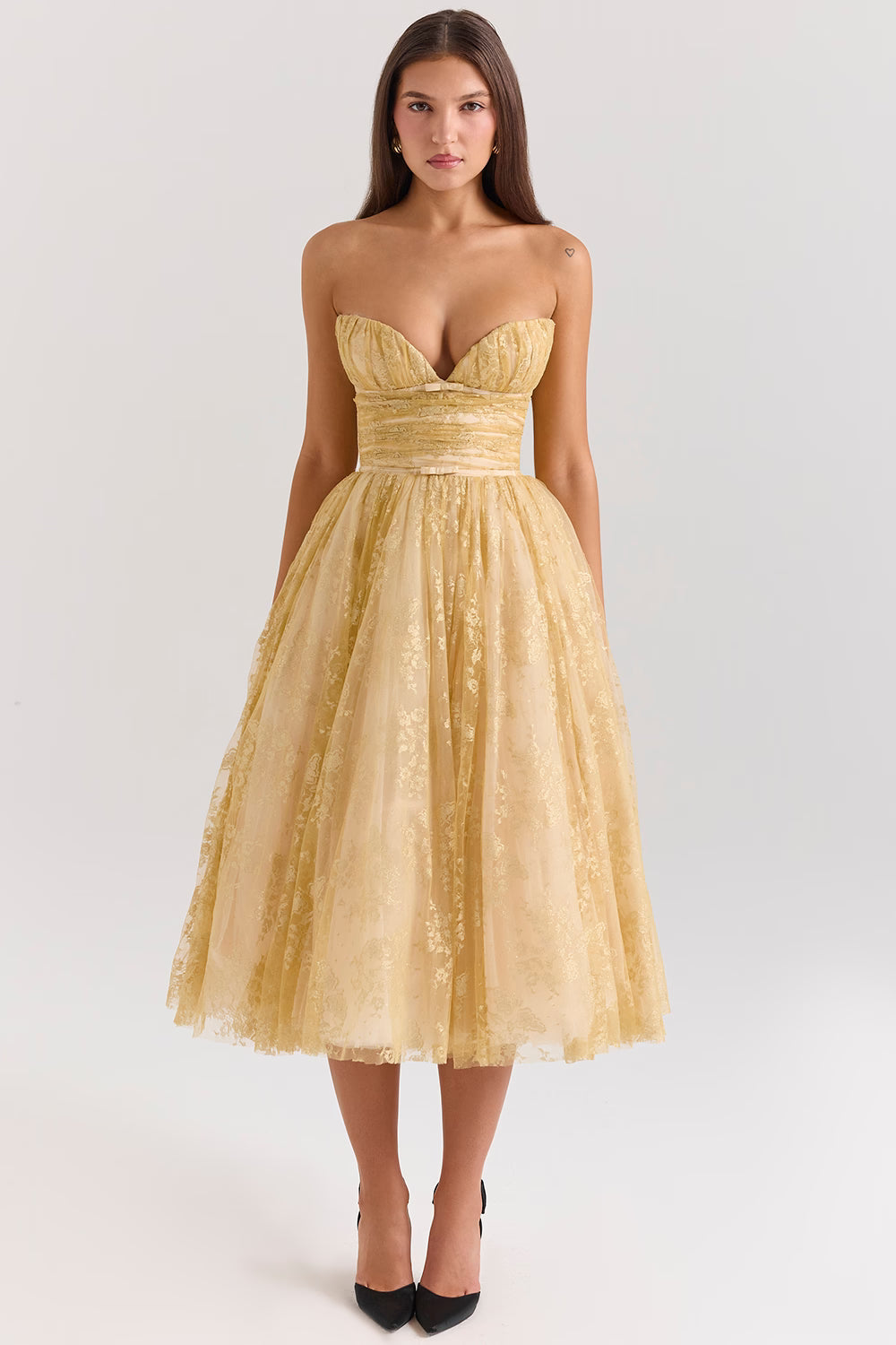Woman wearing gold metallic lace tulle strapless midi gown with ruched waist — House of CB | Endless UAE