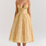 Woman wearing gold metallic lace tulle strapless midi gown with ruched waist — House of CB | Endless UAE