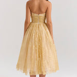 Woman wearing gold metallic lace tulle strapless midi gown with ruched waist — House of CB | Endless UAE