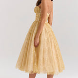 Woman wearing gold metallic lace tulle strapless midi gown with ruched waist — House of CB | Endless UAE