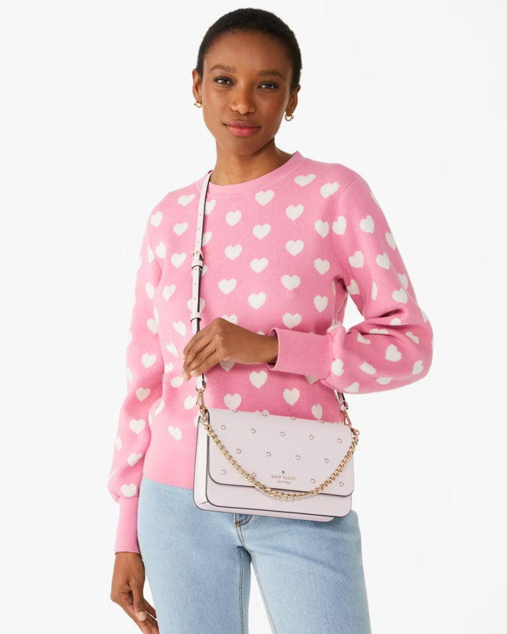 Pale pink leather crossbody bag with stud details and gold chain strap — Kate Spade | Endless UAE